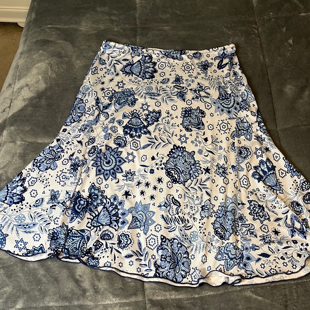 Iight blue, dark blue, and white floral skirt
